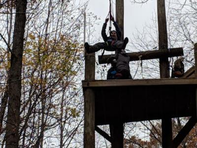 A student on the zip-line